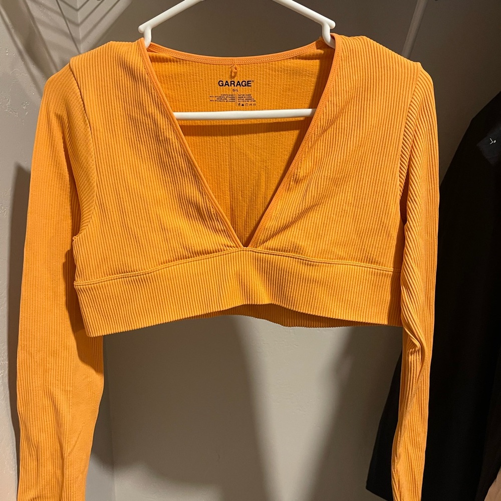 GARAGE LOW V LONG SLEEVE CROP TOP. GREAT CONDITION. NEVER WORN.